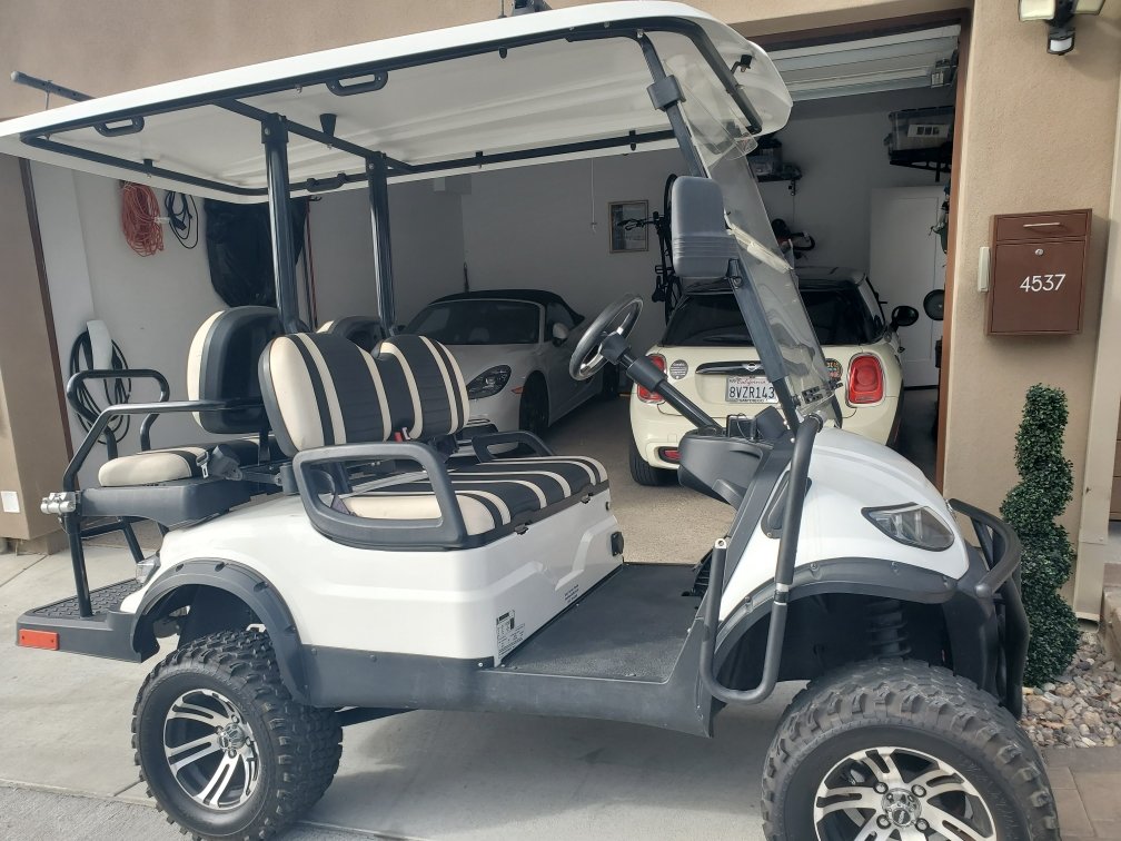 ICON i40L — white, side profile near the beach