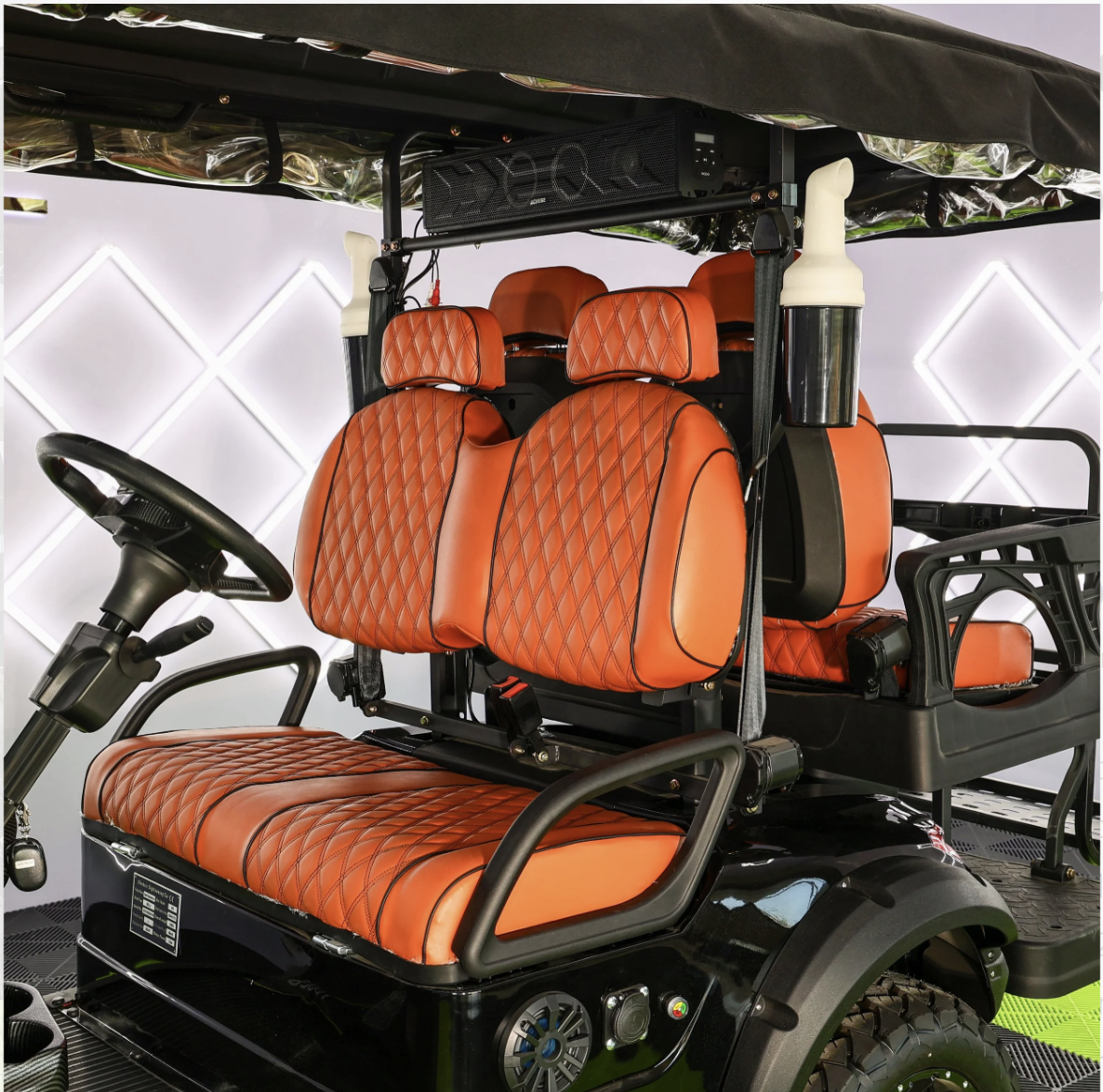 MMC 4+2 — premium orange diamond-stitch seats